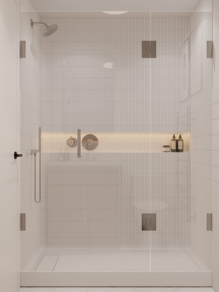 Small modern walk-in shower with sleek fixtures, subway tile, and a warm LED lighting strip by Studium Dekor.
